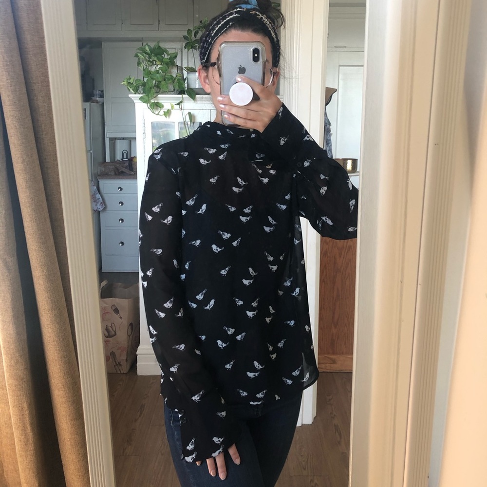 Black long-sleeve top w/ bird print